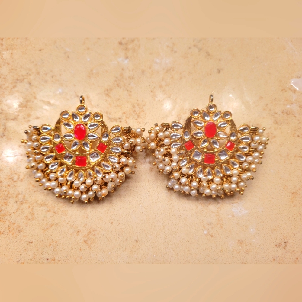 Fancy wedding/party earrings made of pearls and stones